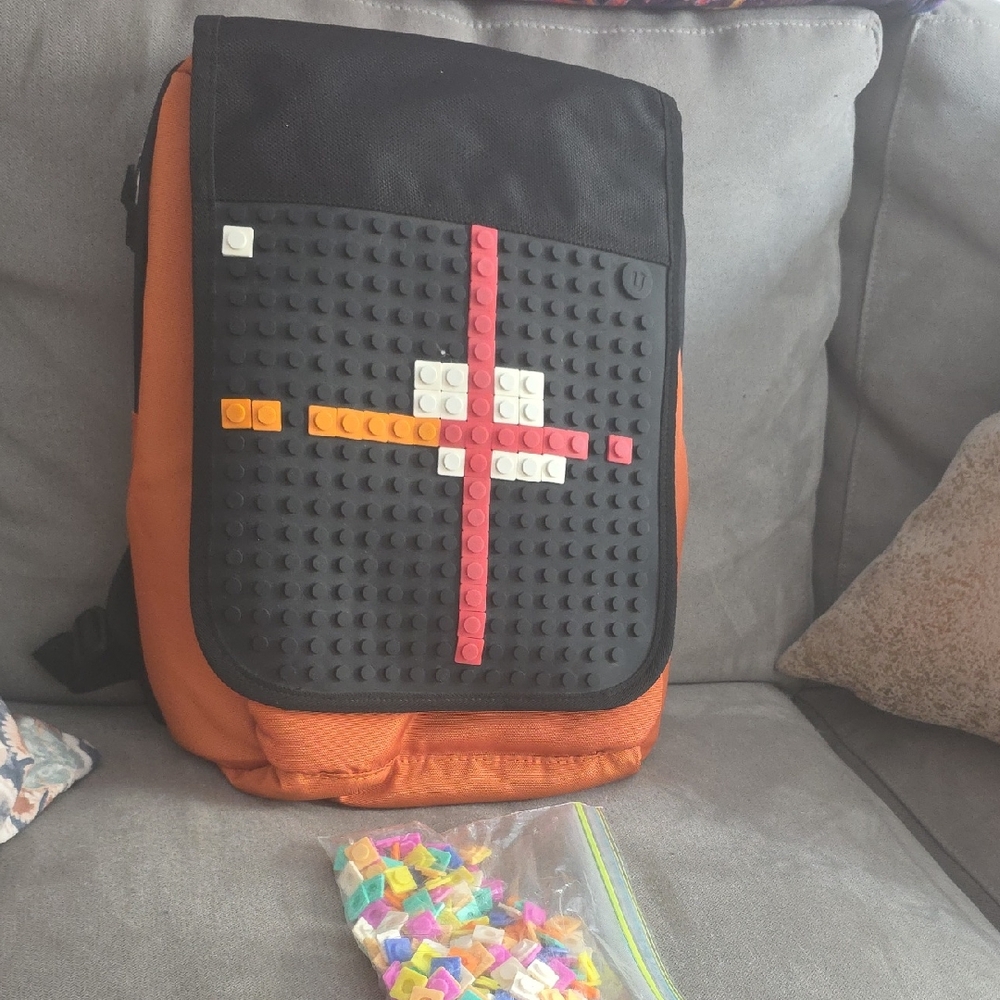 Orange and Black Backpack with Customizable Panel